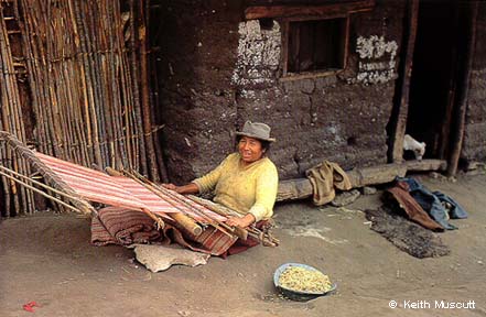 Woman weaving on a backstrap loom - © Keith Muscutt